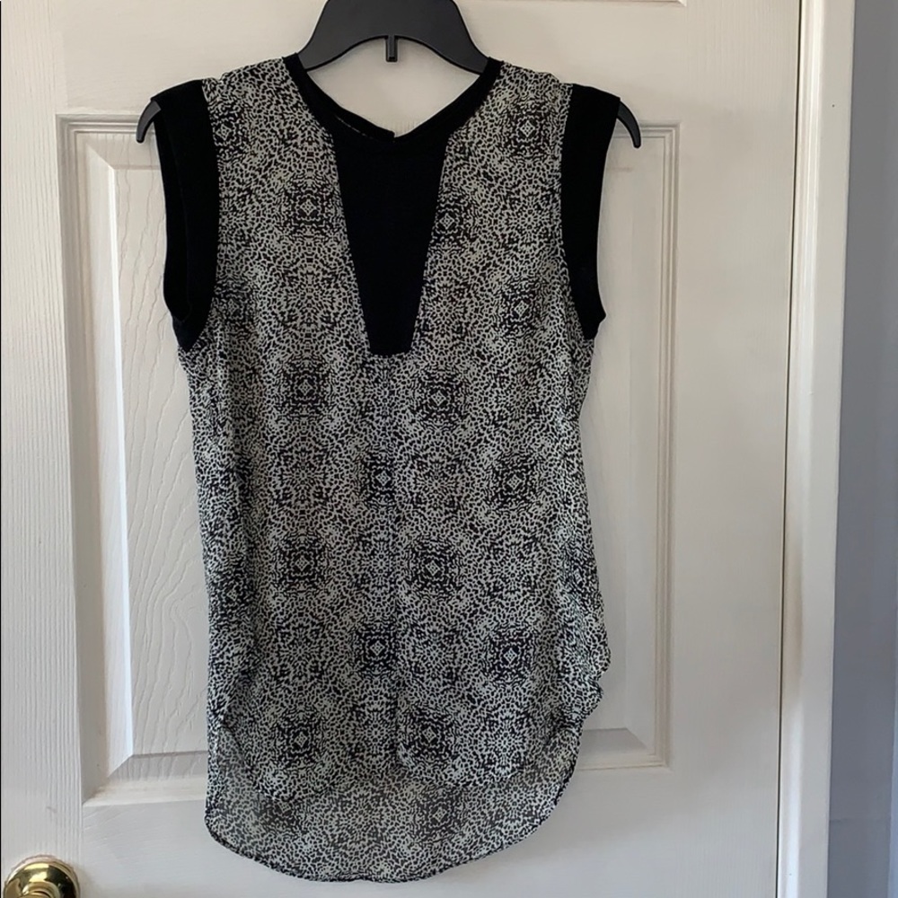 Black and white top. It doesn’t fit any more.